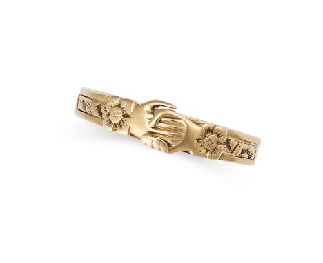 AN ANTIQUE FEDE GIMMEL RING in yellow gold,&nbsp;designed as a trio of hinged bands linked together with hands clasped togeth