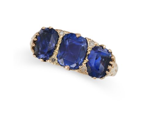 A SAPPHIRE AND DIAMOND DRESS RING in 18ct yellow gold, set with a trio of cushion cut blue sapphires, the sapphires all total