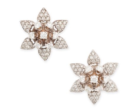 A PAIR OF VINTAGE DIAMOND FLOWER STUD EARRINGS in 14ct white gold, each designed as a flower, set with round cut diamonds, So