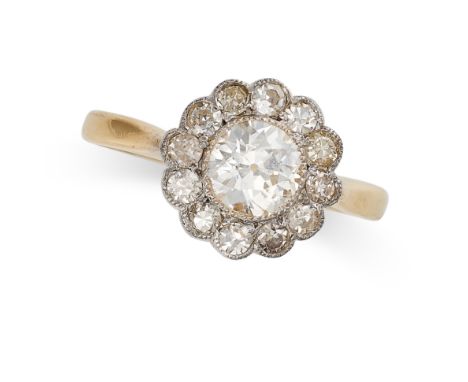 A FINE DIAMOND CLUSTER RING in 18ct yellow gold and platinum, set with a principal old European cut diamond of 0.72 carats wi