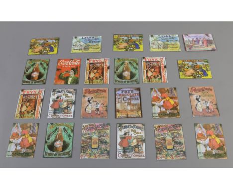 A quantity of miniature enamel advertising plaques after larger originals to include Pig Tail tobacco and Rowntrees examples.