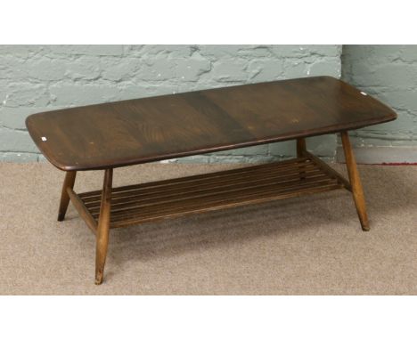 An Ercol two tier coffee table.