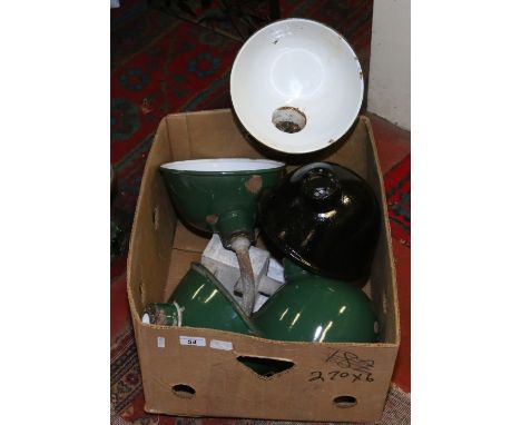 A box of industrial enamelled light fittings. Condition Report. To be used as a guide only. Light shades measure 23cm in circ