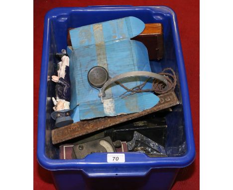 A box of collectables to include Post Office sign, money box parts, AVO ohmmeter, vintage headphones etc.