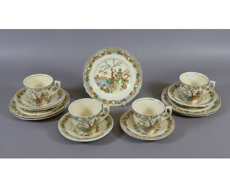An early C20th Coronet ware part tea service printed with oriental scenes, approximately fourteen pieces.