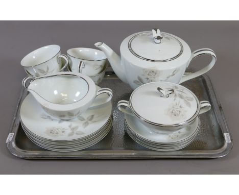 A Noritake china Melrose pattern tea service comprising teapot, four cups, four saucers etc.