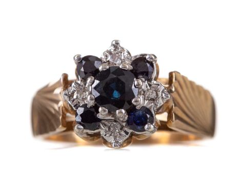 SAPPHIRE AND DIAMOND RING,the round sapphires flanked by illusion set diamond chips, in nine carat gold, size N, 4.4g      