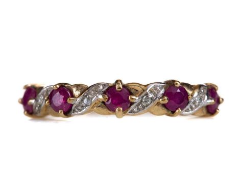 RUBY AND DIAMOND BAND,set with round rubies interspaced by diamond chips, in nine carat gold, size N, 1.8g