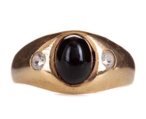 GARNET AND WHITE GEM SET RING,the cabochon garnet flanked by two round white gems, unmarked, size U 1/2, 5.8g