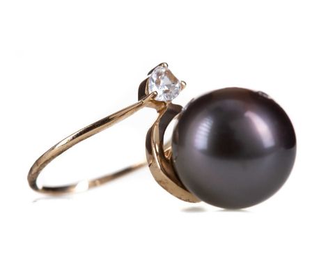 TAHITIAN PEARL RING,the pearl flanked by a pear shaped white gem, in nine carat gold, size Q, 6.6g