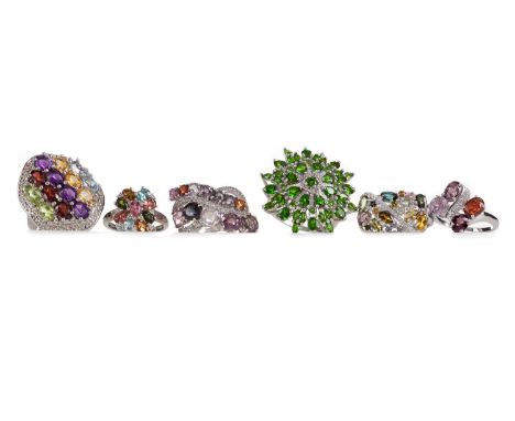 SIX SILVER GEM SET RINGS,set with various gems such as demantoid garnet, topaz, amethyst and peridot, each marked for silver 