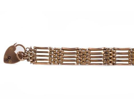 AMENDMENT: BRACELET APPEARS TO BE ROLLED GOLDGATE BRACELET,with nine carat gold heart shaped padlock with engraved initials a
