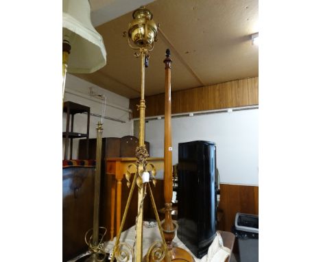 Two Standard Lamps Together With A Telescopic Oil Lamp Stand