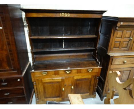 An 18th Century Oak & Later Dresser Having A Two Shelf Rack, The Base Having Three Drawers Above Two Side Cupboard Doors