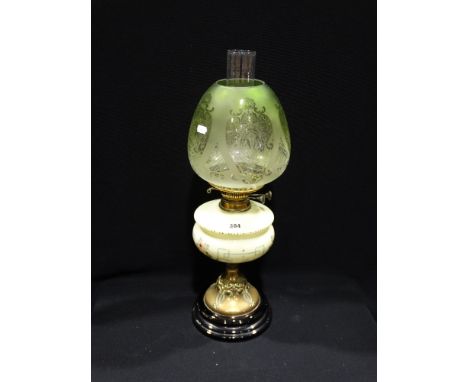 A Brass Column Oil Lamp With Painted Glass Reservoir & Etched Green Glass Shade