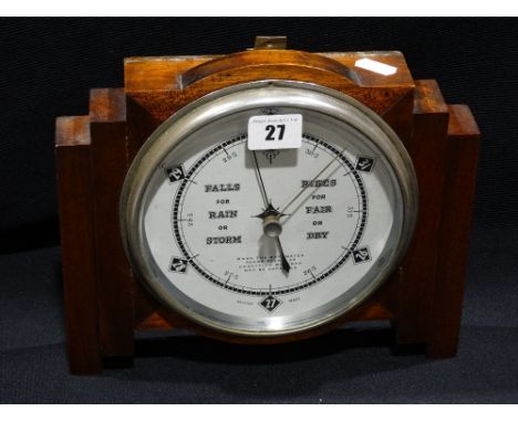 An Art Deco Period Oak Framed Barometer With Circular Dial