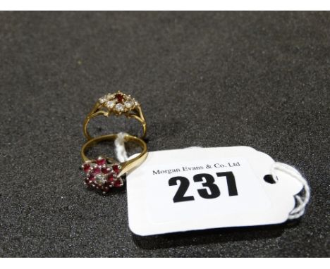 A 9ct Gold Ruby & Diamond Cluster Ring Together With A Further 9ct Gold Dress Ring