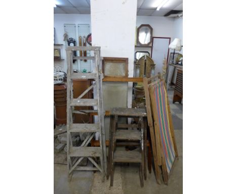 A clothes airer, two deck chair, two step ladders, etc. 