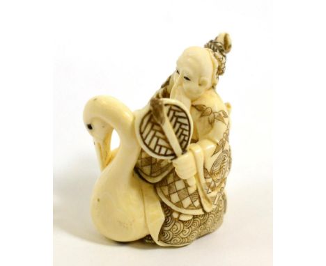 A Japanese Ivory Netsuke, signed Gyokuho, Meiji period, as Jorojin riding on the back of a crane, 4.5cm 