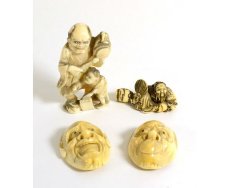 A Japanese Ivory Okimono, Meiji period, as an oni playing a gong, 7.5cm; A Pair of Netsuke, as Noh masks; and Another, as a s