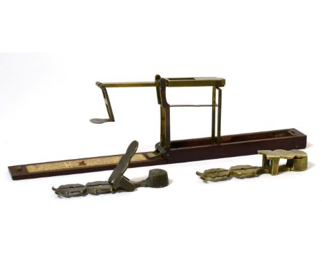 A 19th Century Mahogany Folding Guinea Scale; and Two Brass Sovereign Balances (3)