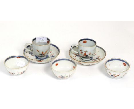 A Chinese Porcelain Part Service, 18th century, painted in famille rose enamels with stylised foliage, comprising three tea b