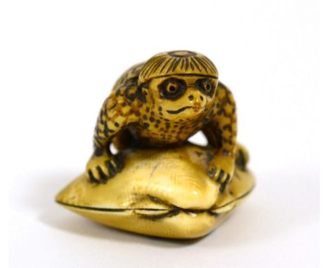 A Japanese Ivory Netsuke, signed Gyokuzan, Edo/Meiji period, as Kappa on a clam shell, 4.5cm 