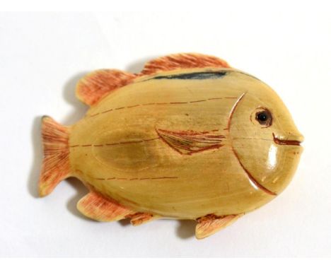 A Japanese Ivory Netsuke, signed Tomoichi, Meiji period, as a flat fish, 5.5cm long