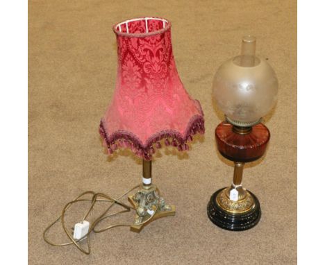 A Victorian Brass Oil Lamp, with etched shade, cranberry reservoir and fluted column, 58cm high; and A Brass Table Lamp Base,