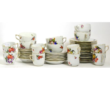 A Herend Porcelain Tea and Coffee Service, 20th century, painted with fruit and flowers within ozier borders, comprising six 
