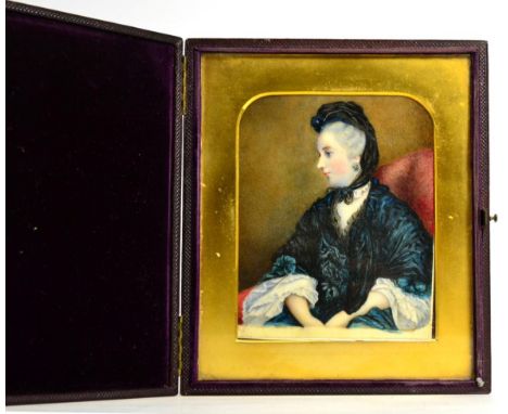 Victorian School: A Miniature Portrait of a Lady, half length seated, wearing a black scarf and dark green dress, on ivory, 1