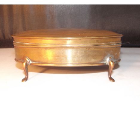 A tortoise shell and brass trinket box with padded interior