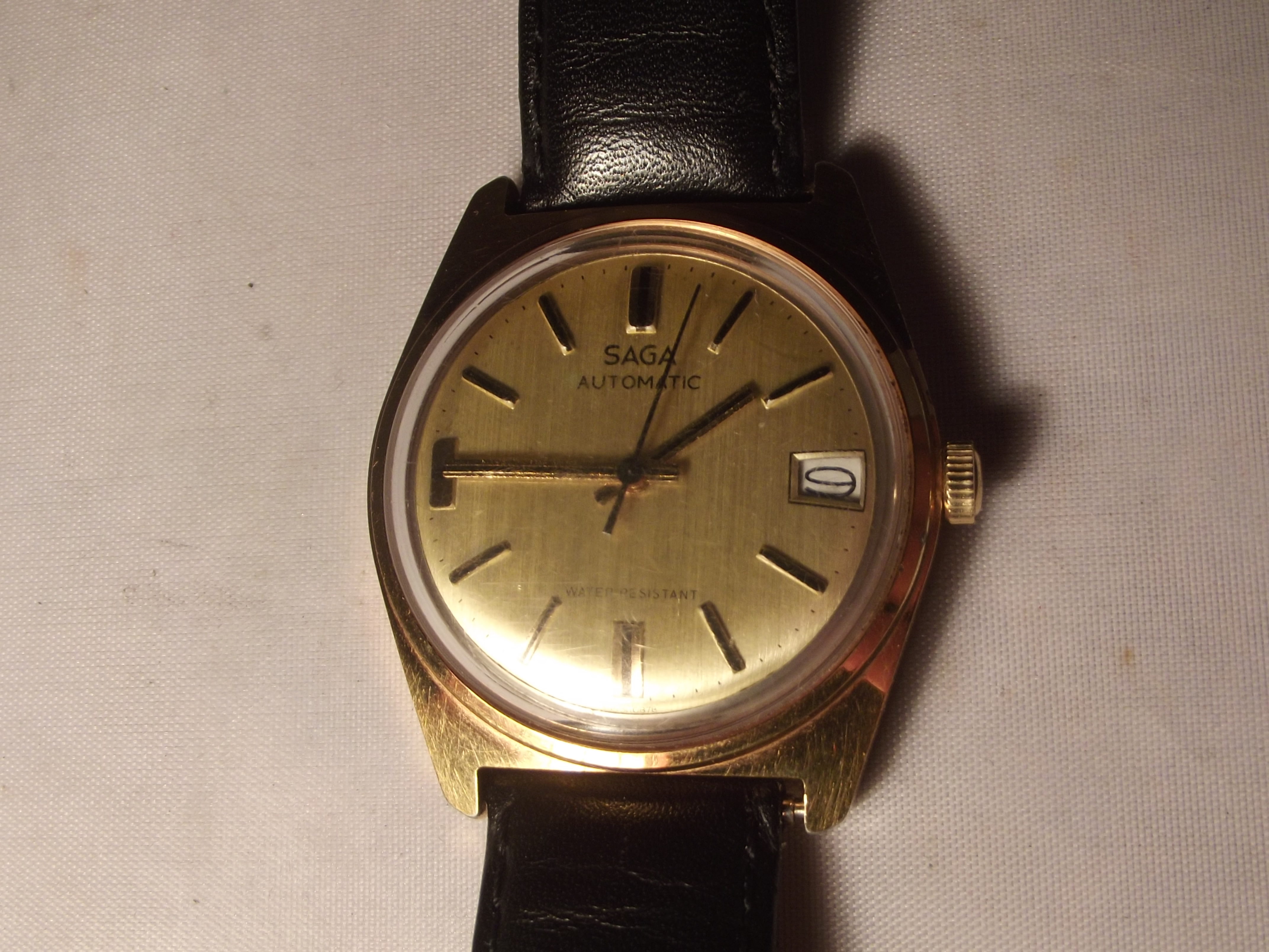 A Vintage Saga Automatic Wristwatch With Leather Strap