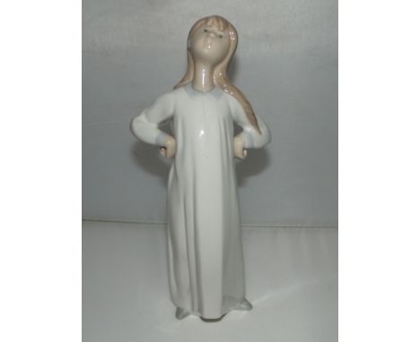 LLadro figure of a standing girl. 8 inches tall