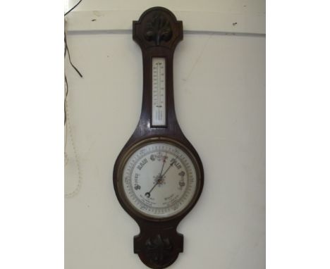 A banjo barometer 28 inches long