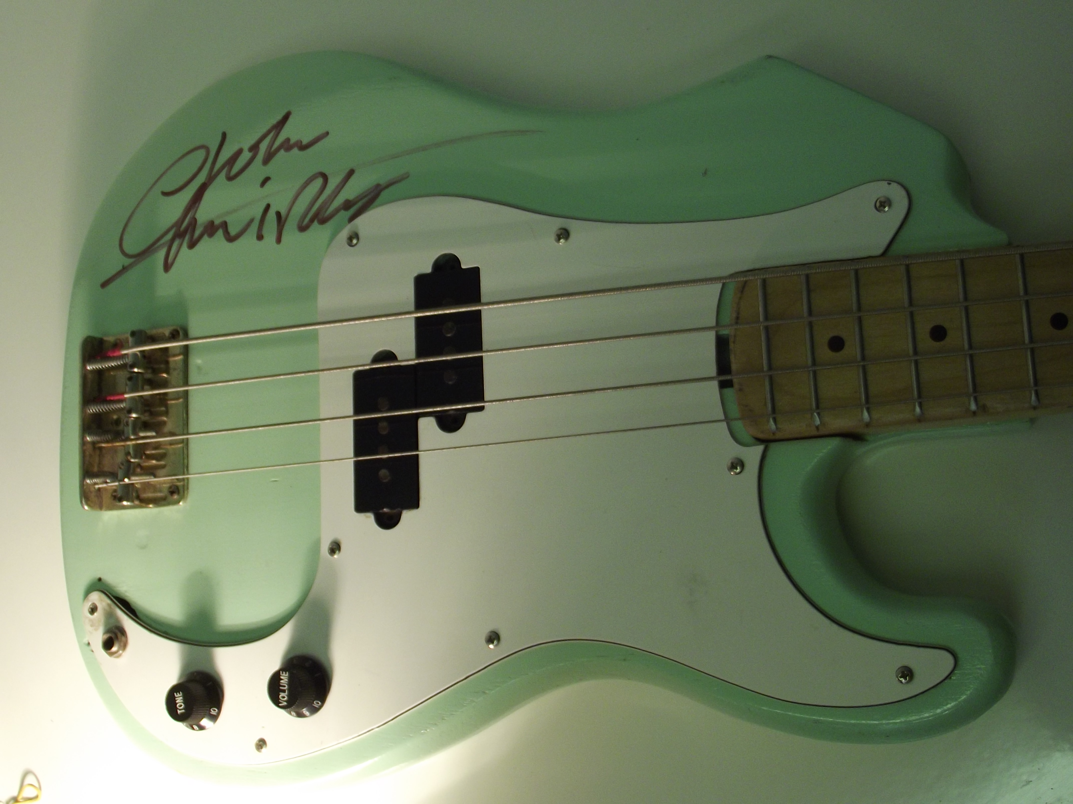 A guitar signed by John Entwistle from "The Who" With COA. Guitar