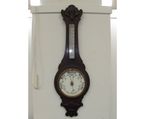 A banjo barometer 35 inches long