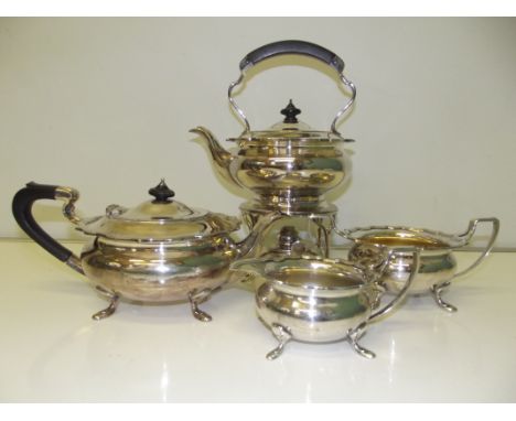 Elkington silver plated four piece tea service comprising spirit kettle and stand, cream jug, sucrier and teapot, shaped edge