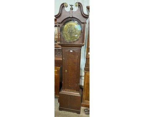 A 19th Century oak 8-day longcase clock, the circular brass dial signed R. Todd, Scarborough 