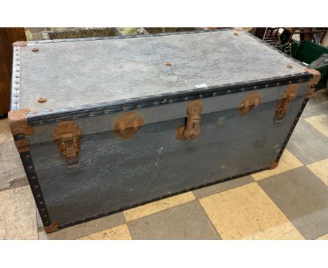 A metal bound steamer trunk 