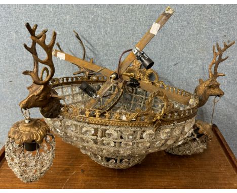 A French Empire chandelier, with antelope head figures 