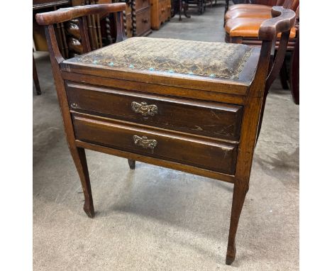 An Edward VII mahogany piano stool and barometer 