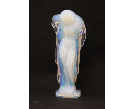 A Sabino glass figure, of a semi naked woman draped in a cloak, 17.5cm high, stamped "Sabino, Paris"
