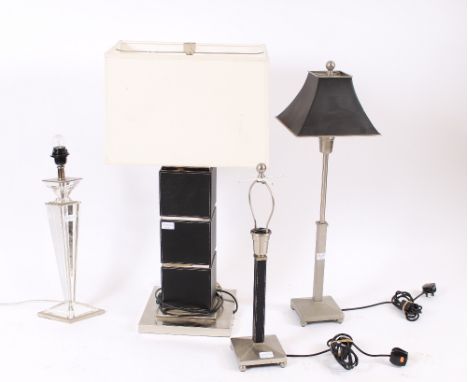 A leather and chrome mounted table lamp with white shade, a smaller similar, a chrome square column table lamp and a crystal 