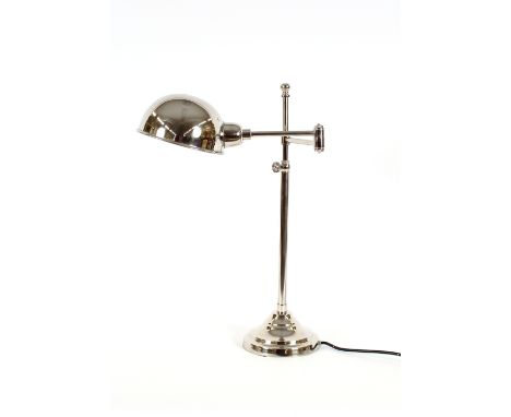 A chrome desk lamp