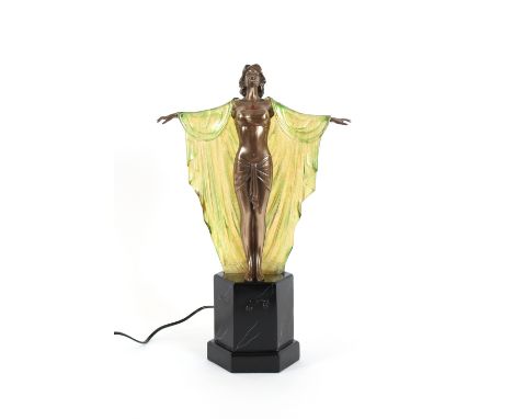 An Art Deco style figural table lamp, in the form of girl wearing a cape