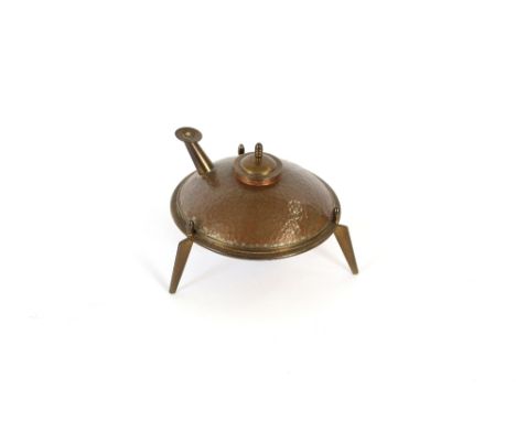An unusual Art Deco design copper and brass lamp, with spot hammered decoration