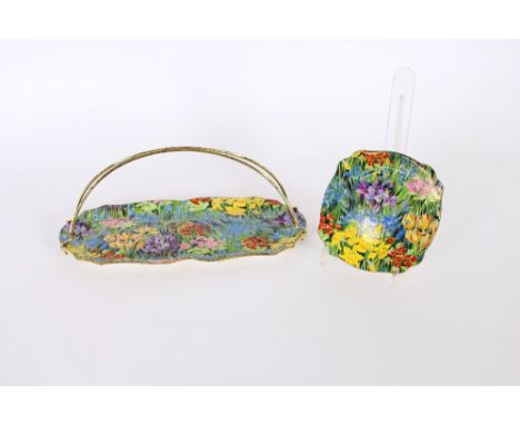 A Wilkinson pottery spring flower decorated sandwich set; and a Maling ware floral decorated plate (8)