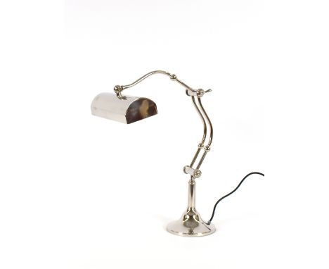 A chrome desk lamp