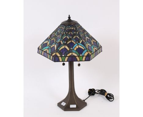 A bronzed Tiffany design table lamp, having blue, turquoise and cream leaded shade, 63cm high overall